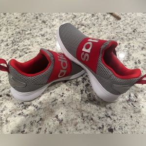 Brand new never worn boys size 3.5 Adidas shoes